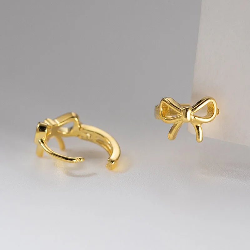 Real 925 Sterling Silver Hollow Bow Stud Earrings DS4952