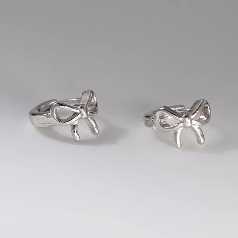 Real 925 Sterling Silver Hollow Bow Stud Earrings DS4952