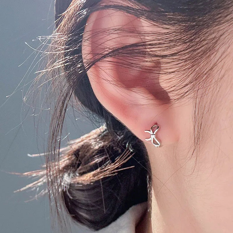 Real 925 Sterling Silver Hollow Bow Stud Earrings DS4952