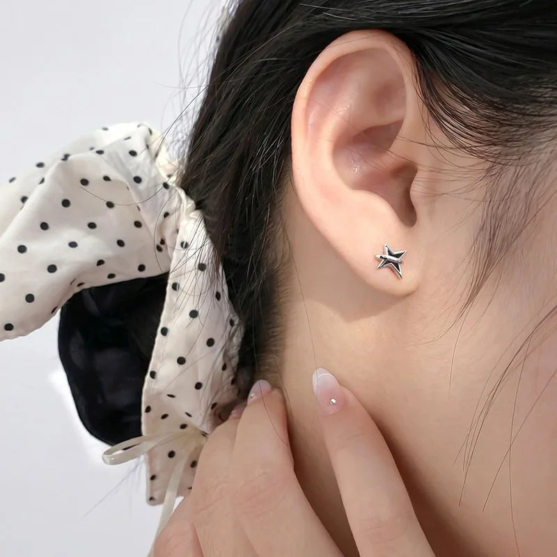 Fashion and Minimalist Black Four-pointed Star Stud Earrings DS4936
